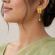Model Wearing Gold Plated Swastik Shield Hanging Ball Drop Earrings DBC1494
