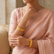 Gold Plated Round Emblem Textured Bangles