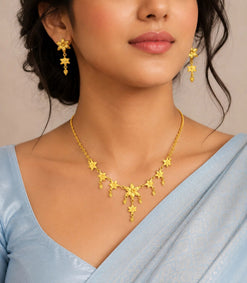 elegant gold plated floral motif necklace set on woman DST10212